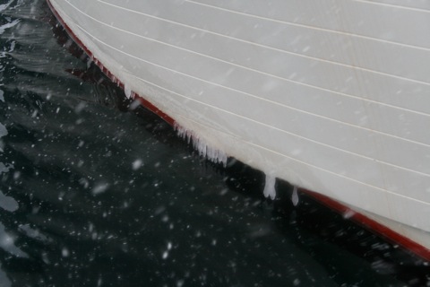 Ice on the side of a boat