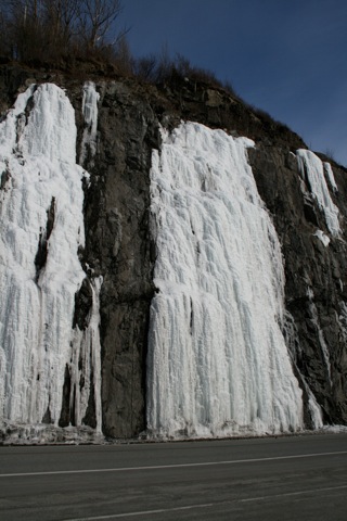 Frozen ice on side of cliff