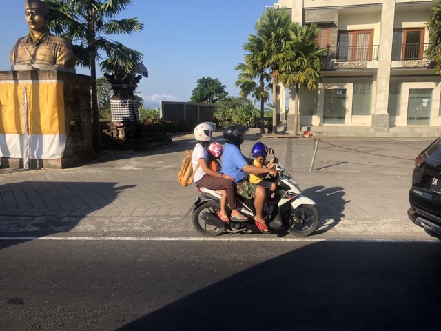 Another family of four on a scooter