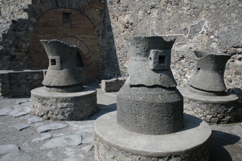 Casa di Pana (House of Bread): Wheat grinders that were used to make flour by having the top part rotate, powered by a donkey