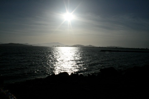Sun shining over the bay