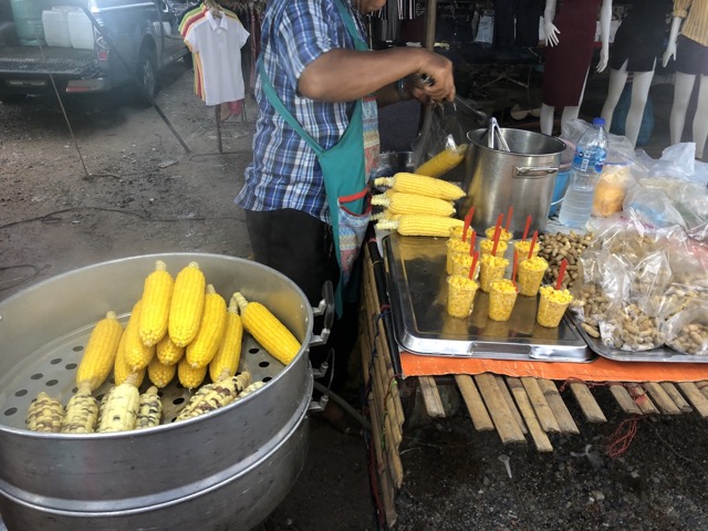 Market across the street selling corn