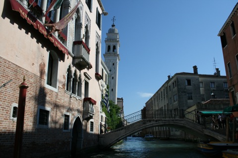 Canal with another bell tower