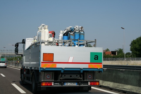 Truck carrying gas tanks